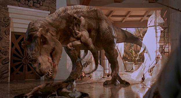 A production still of the T-Rex preying on the velociraptors that had been about to attack Grant, Ellie, and the kids