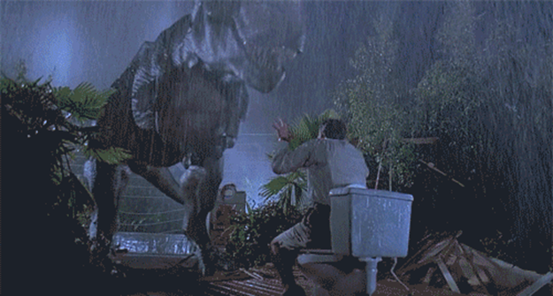 Gif of the T-Rex in Jurassic Park devouring the lawyer who abandoned everyone else and tried to take refuge in the toilets to save himself.